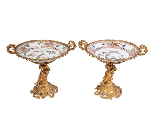 COPPIA DI PIATTI IN PORCELLANA MONTATI A ORMOLU