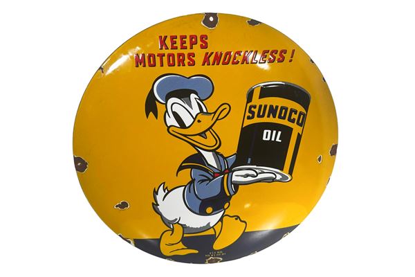 A SUNOCO OIL ENAMELLED DOMED ADVERTISING PLAQUE