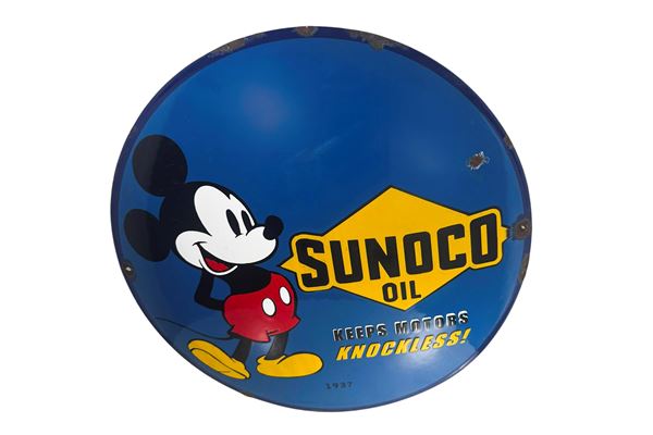 A SUNOCO OIL ENAMELLED DOMED ADVERTISING SIGN