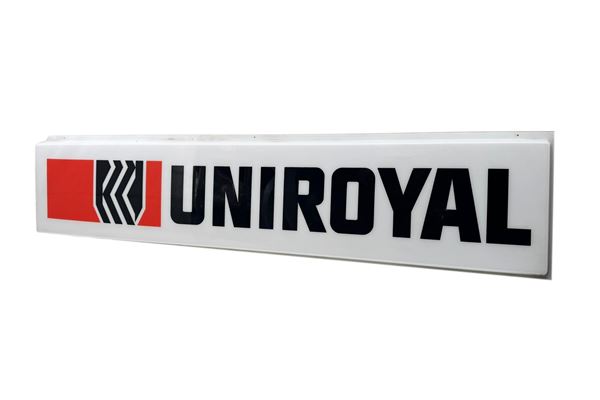 A UNIROYAL TIRES ADVERTISING SIGN FRONT PANEL