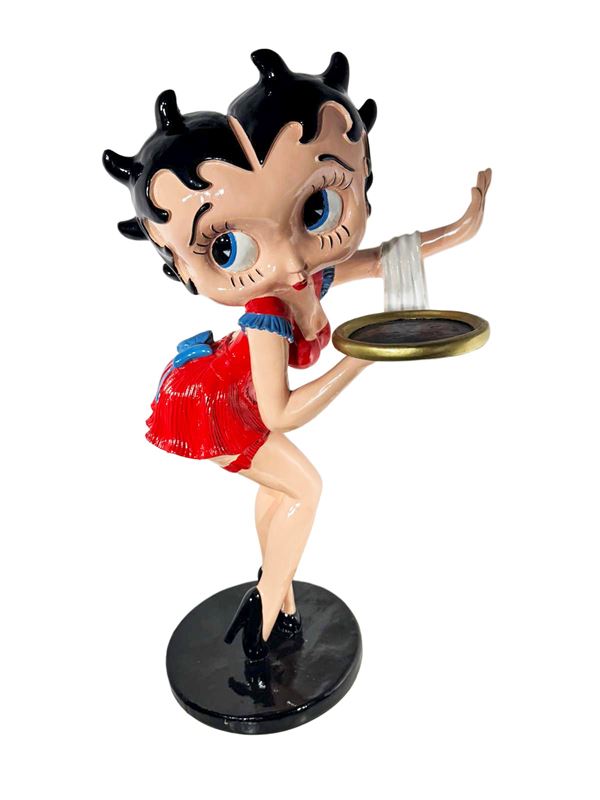 A RESIN BETTY BOOP COLLECTIBLE FIGURINE AS A WAITRESS WITH TRAY