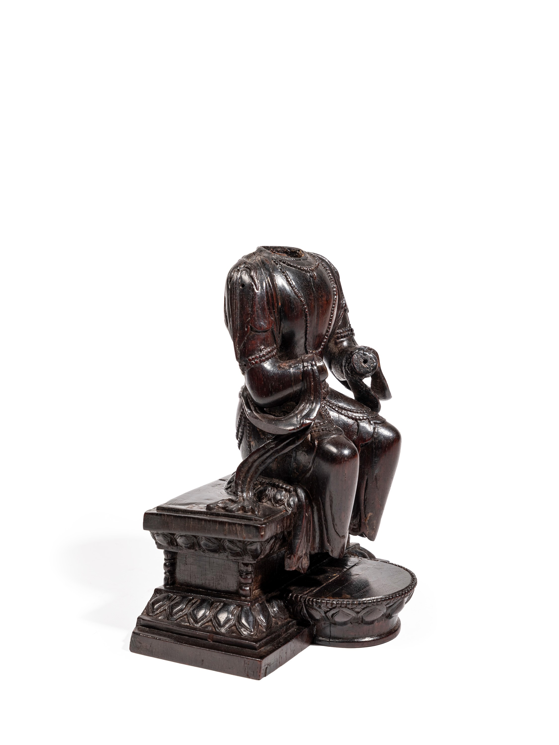 Cina, dinastia Qing (1644-1911), Figura in legno zitan raffigurante una divinità buddista seduta