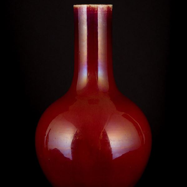 A MONOCHROME RED-GLAZED VASE