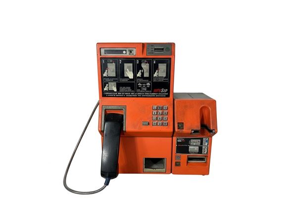 TELECOM RED COIN-OPERATED TELEPHONE BOOTH