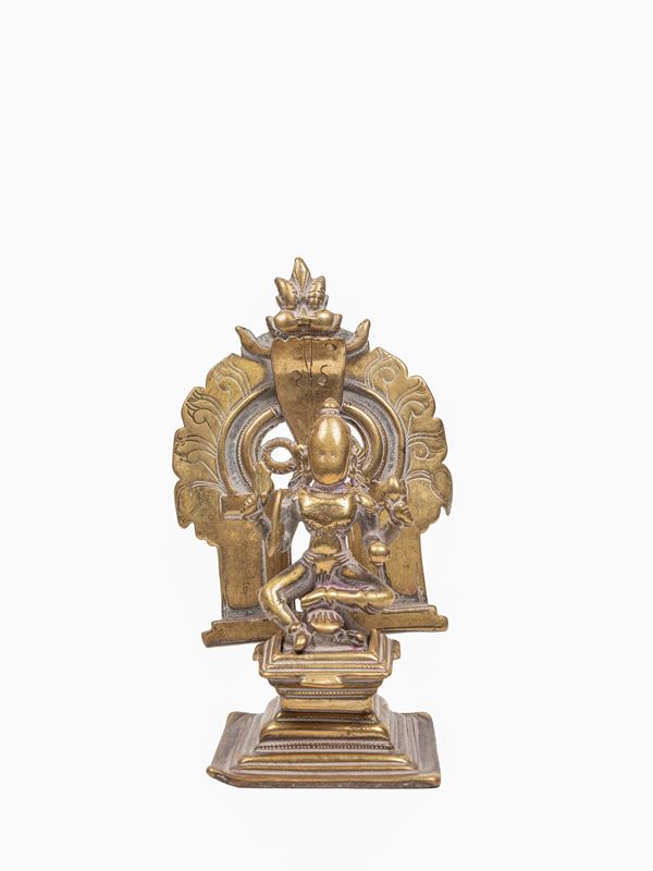 A BRONZE ALTAR WITH DEVI