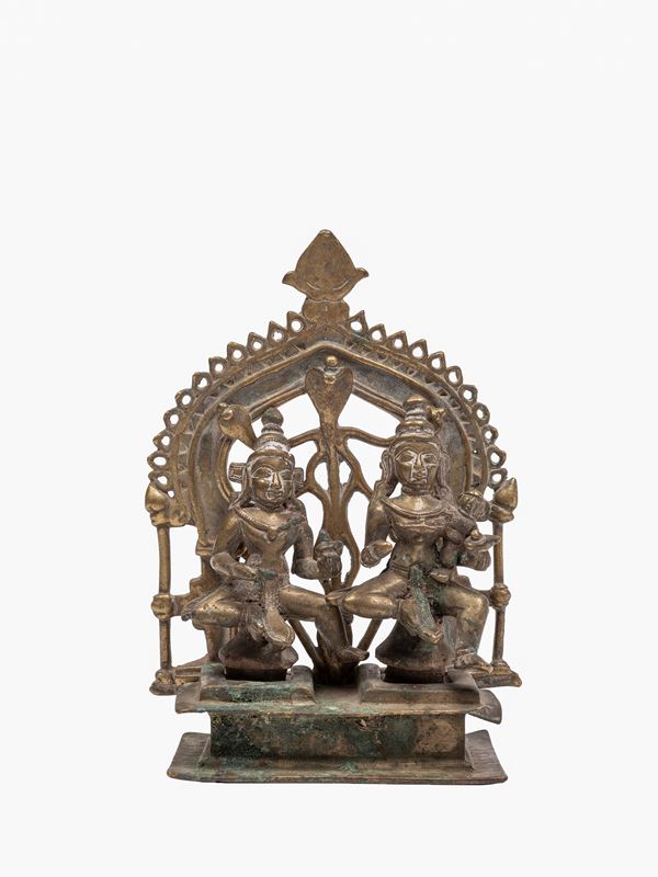 A BRONZE HOUSEHOLD ALTAR WITH THE TWO GAURIS