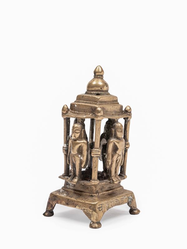A BRONZE ALTAR WITH FOUR JAIN FIGURES 