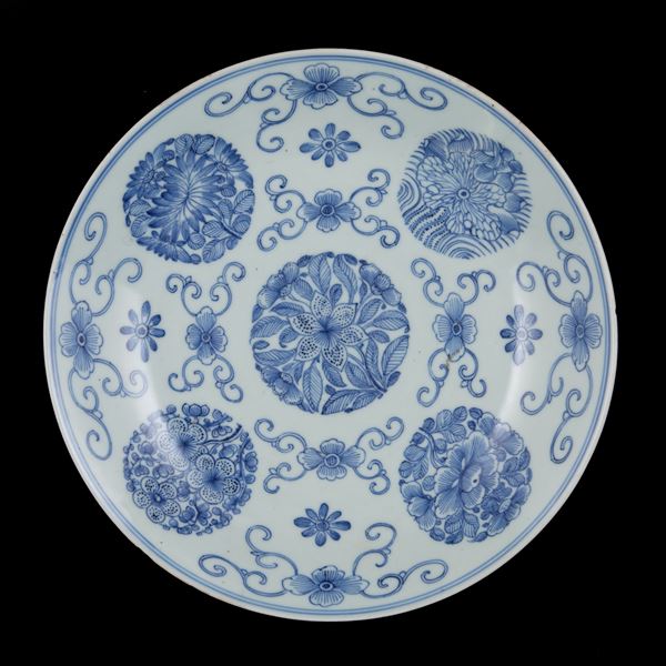 A BLUE AND WHITE DISH