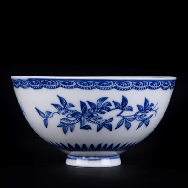 A BLUE AND WHITE CUP