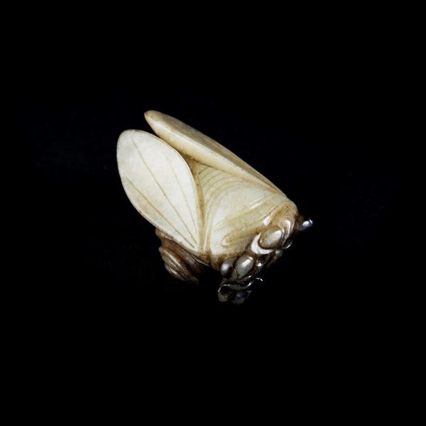 A CARVED MOTTLED JADE CICADA AND POMEGRANATE
