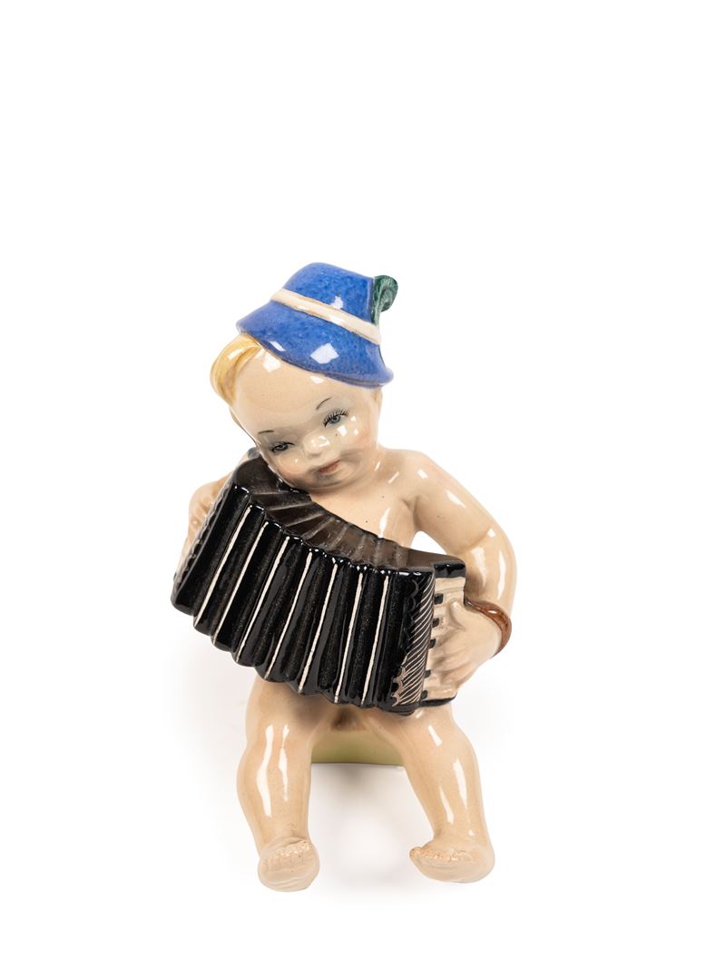 BAMBINO CHE SUONA LA FISARMONICA