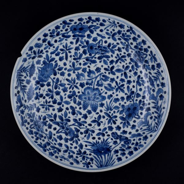 A BLUE AND WHITE DISH