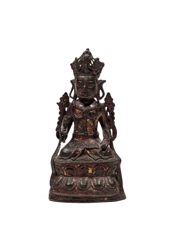 A GILT-BRONZE FIGURE OF GUANYIN
