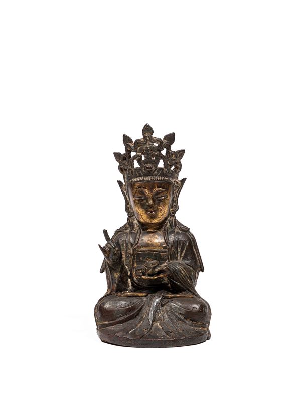 A GILT-BRONZE FIGURE OF AVALOKITESVARA