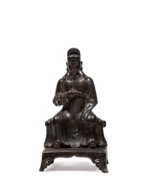 A BRONZE FIGURE