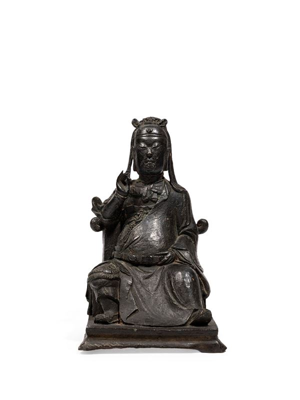 A BRONZE FIGURE