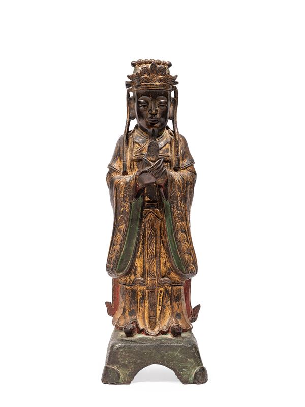 A BRONZE FIGURE 