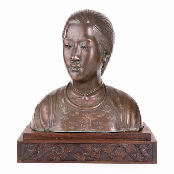 A BRONZE HALF-BUST
