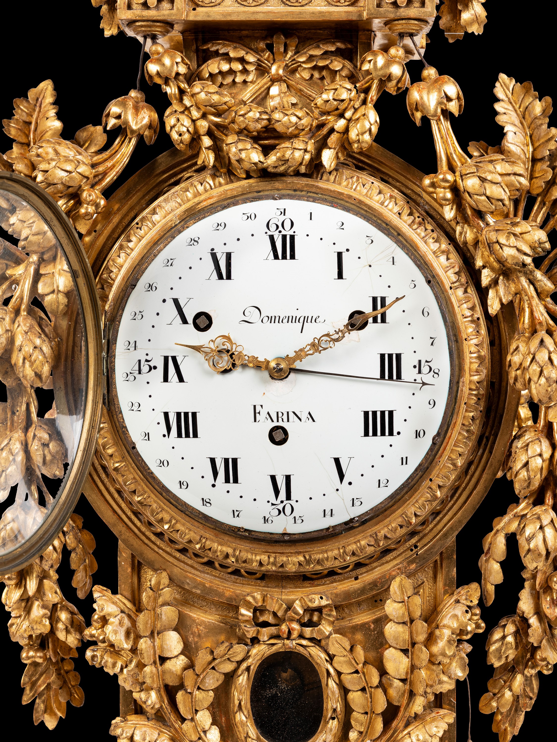 Francesco Bolgiè (attrib.), Orologio cartel, cassa in legno dorato a foglia, XVIII secolo