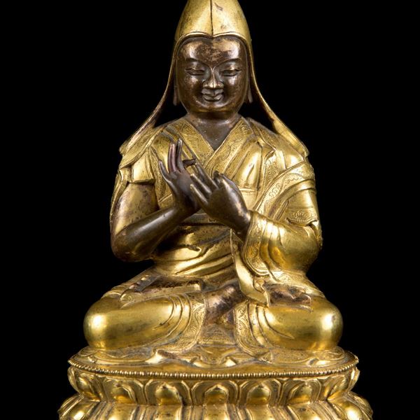 A GILT-BRONZE FIGURE OF TSONGKHAPA