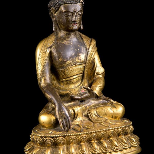 A GILT-BRONZE FIGURE OF BUDDHA IN BUMISPARSHAMUDRA 