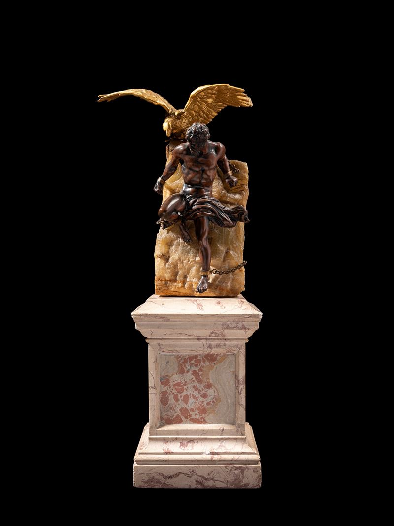 Francia, fine XIX secolo, Prometeo incatenato, bronzo a patina scura su piedistallo in scagliola