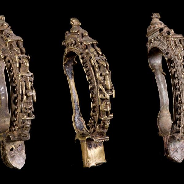THREE BRONZE DAGGER HANDLES