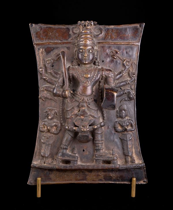 A VIRABHADRA BRONZE RITUAL PLATE