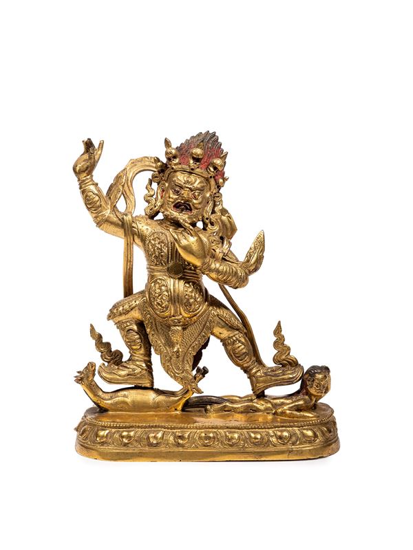 A GILT-BRONZE FIGURE OF BEGTSE CHEN