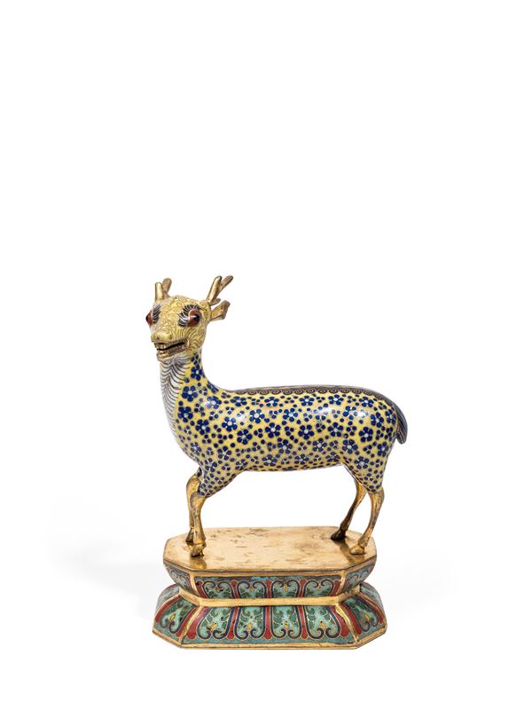 A CLOISONNÉ FIGURE OF A DEER