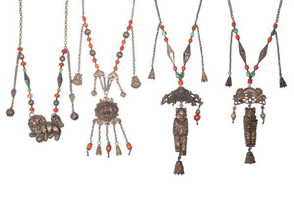 FOUR SILVER AND HARDSTONES NECKLACES