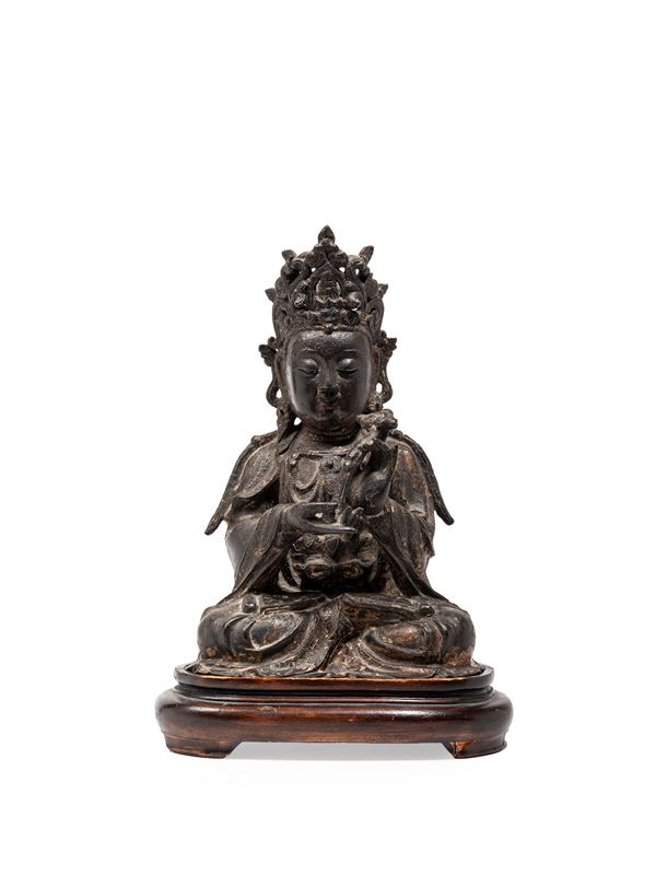A GILT-BRONZE FIGURE OF AVALOKITESVARA