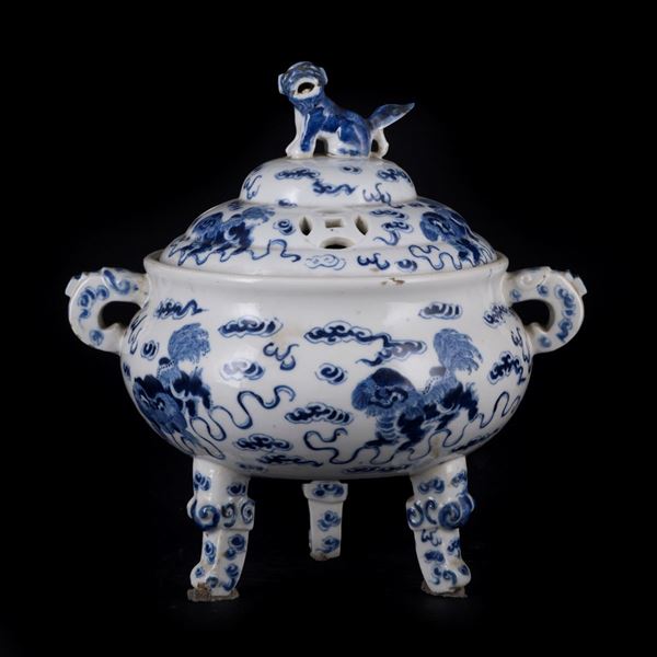 A BLUE AND WHITE TRIPOD CENSER