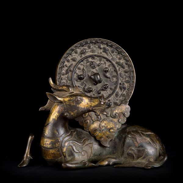 A GILT-BRONZE MIRROR-STAND AND MIRROR