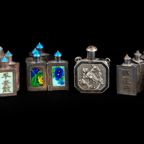 EIGHT SILVER SNUFF BOTTLE