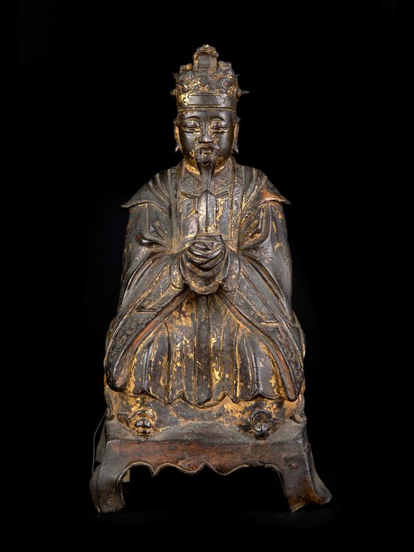 A GILT-BRONZE FIGURE