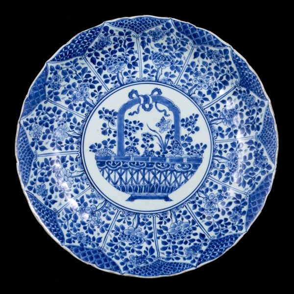 A BLUE AND WHITE DISH