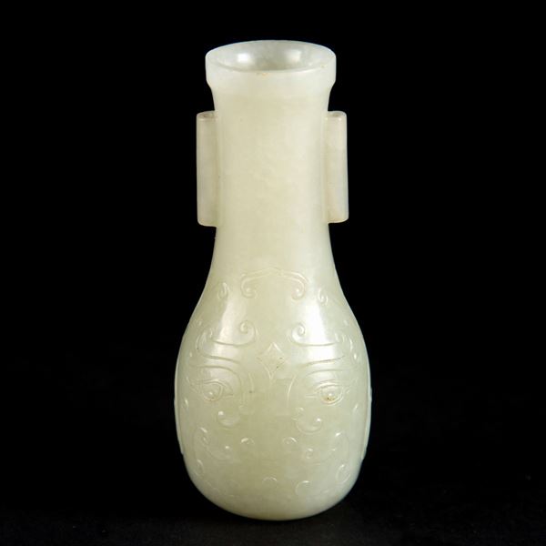 A SMALL CELADON VASE