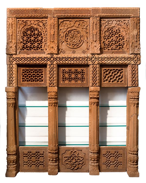 A MUGHAL CARVED RED SANDSTONE PORTAL