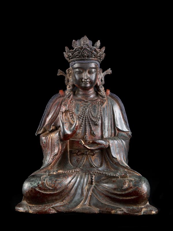 A BRONZE FIGURE OF BUDDHA