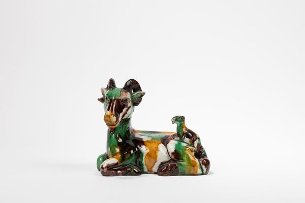 A SANCAI PORCELAIN FIGURE