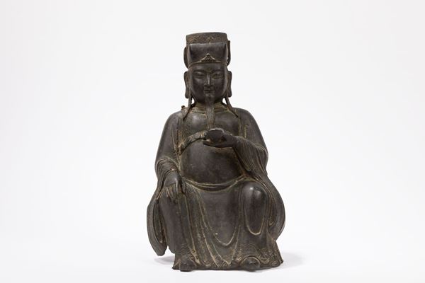 A BRONZE FIGURE