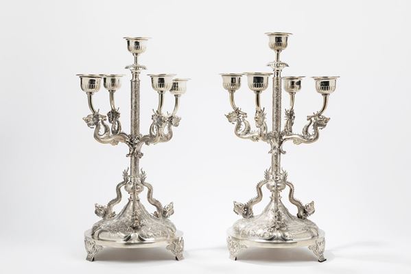 A RARE PAIR OF SILVER CANDELABRA