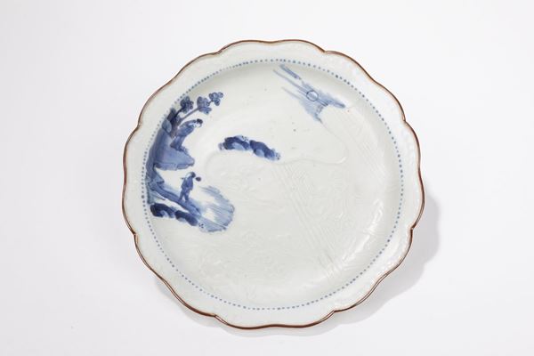 A PORCELAIN PLATE