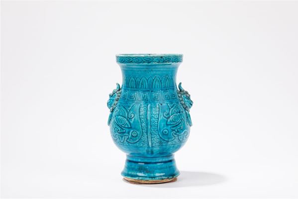 A TURQUOISE PORCELAIN VASE