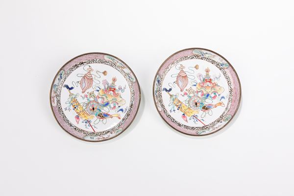 A PAIR OF ENAMEL ON COPPER SAUCERS