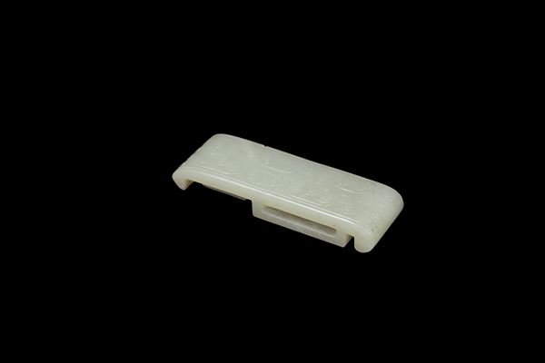 A WHITE JADE SWORD SLIDE