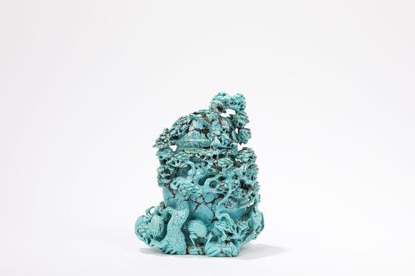 A TURQUOISE CARVED VASE